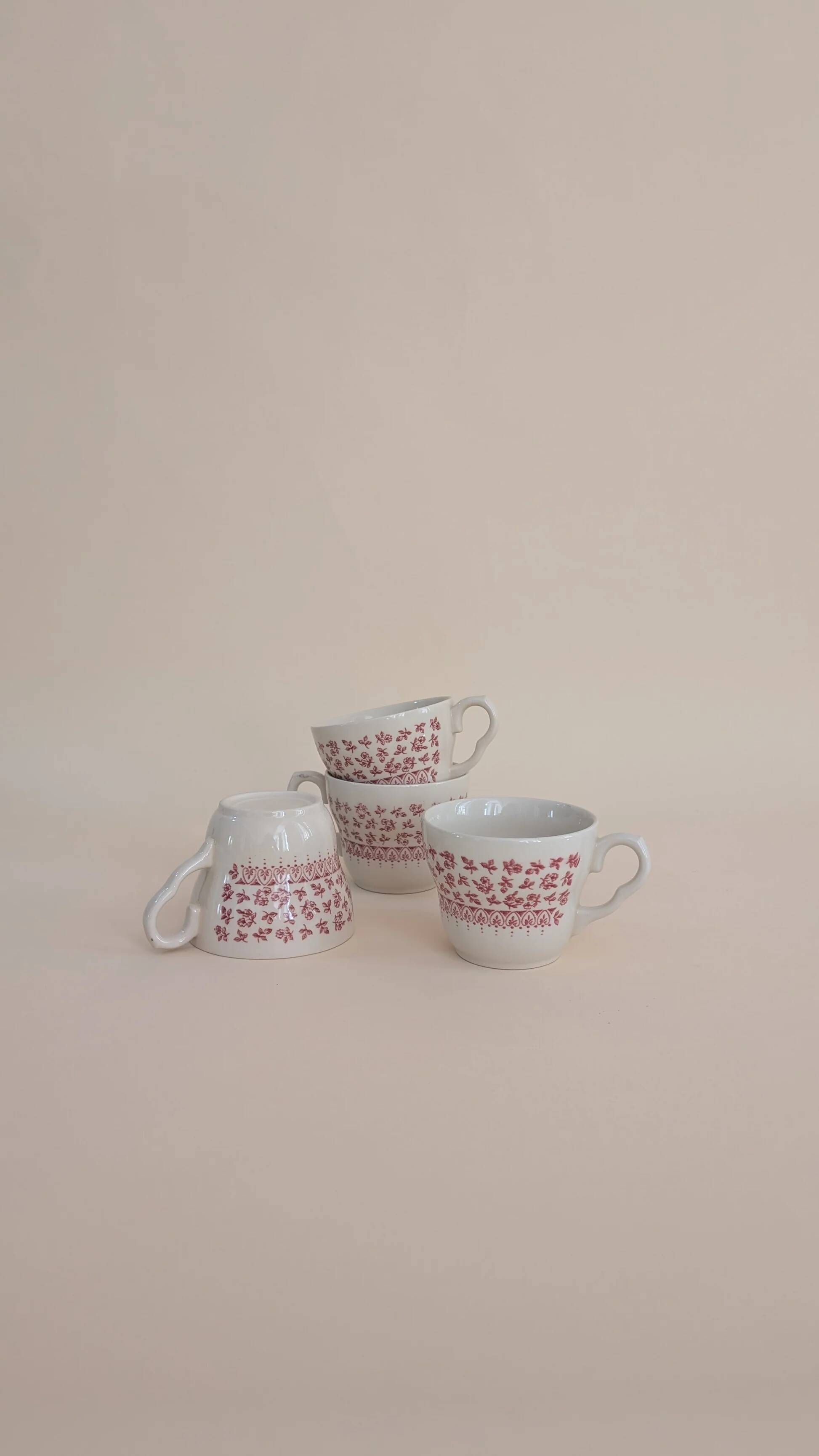 Set of 4 red ceramic mugs