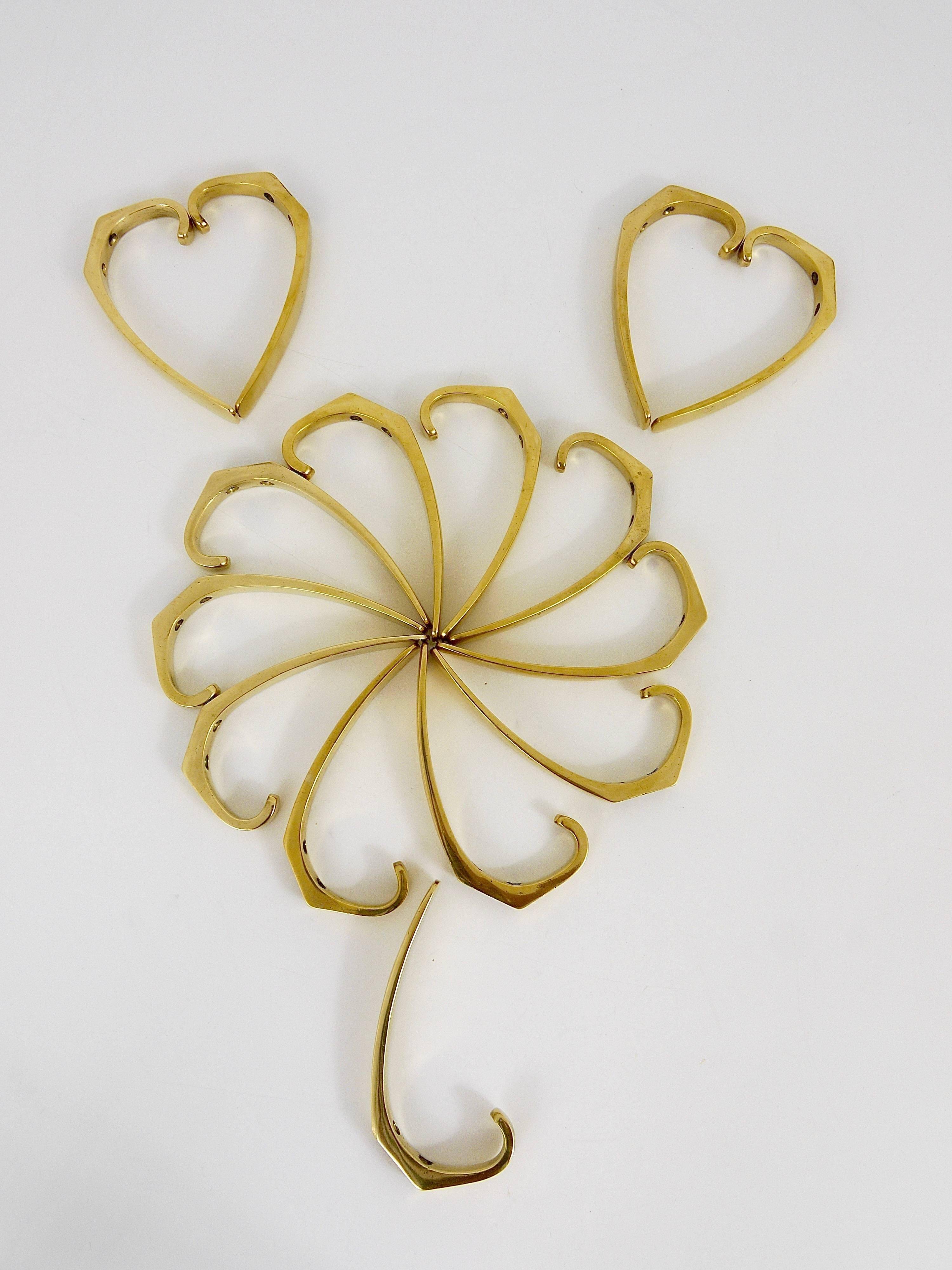 9 vintage brass wall hooks by Herta Baller, Vienna, Austria, 1950s.