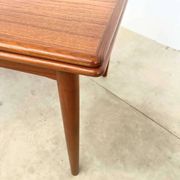 Teak dining table with integrated extensions — Scandinavian