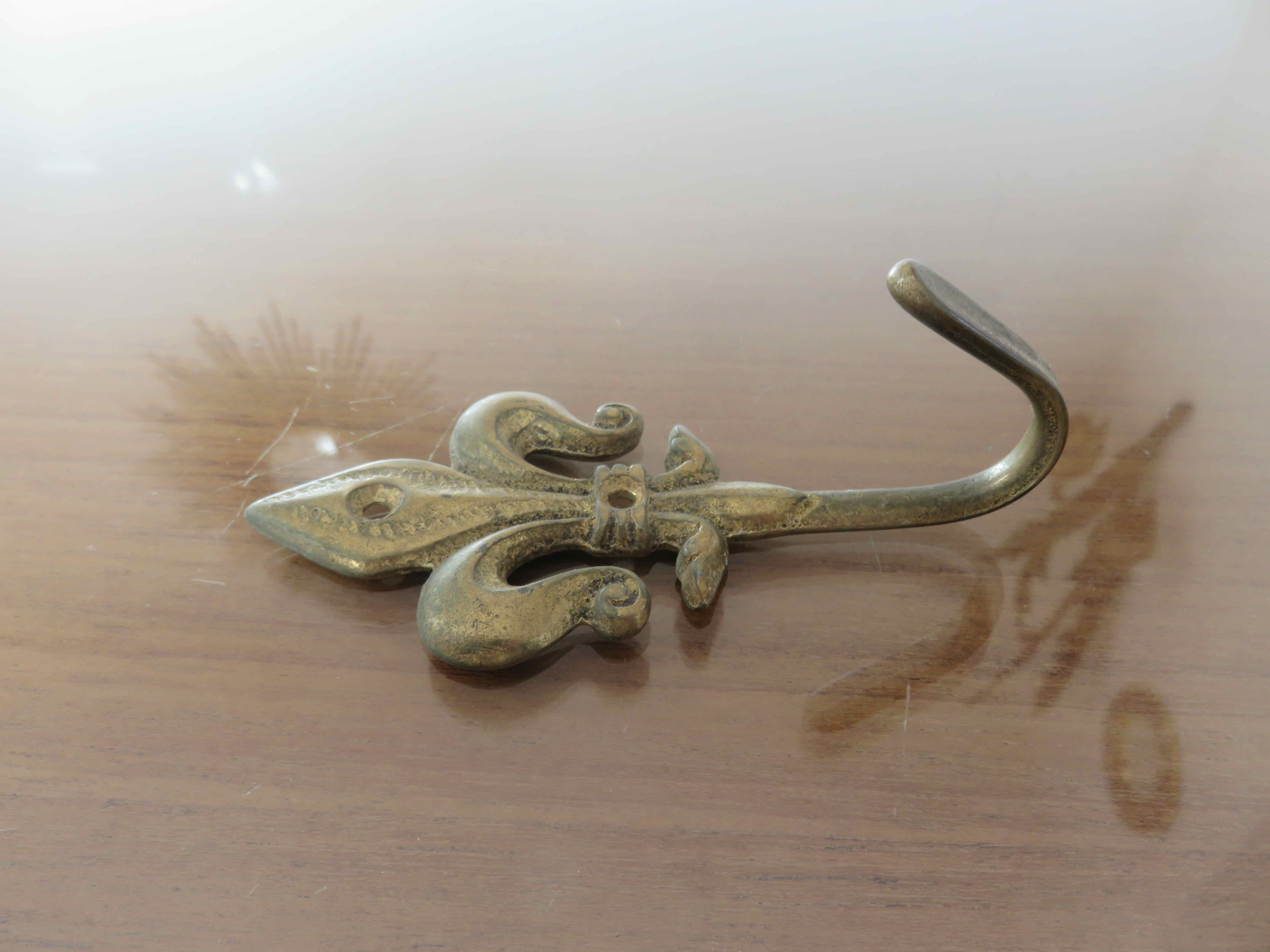 Brass "fleur de lys" hook 30-40s