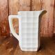 A pair of vintage ceramic jugs from the 1950s.