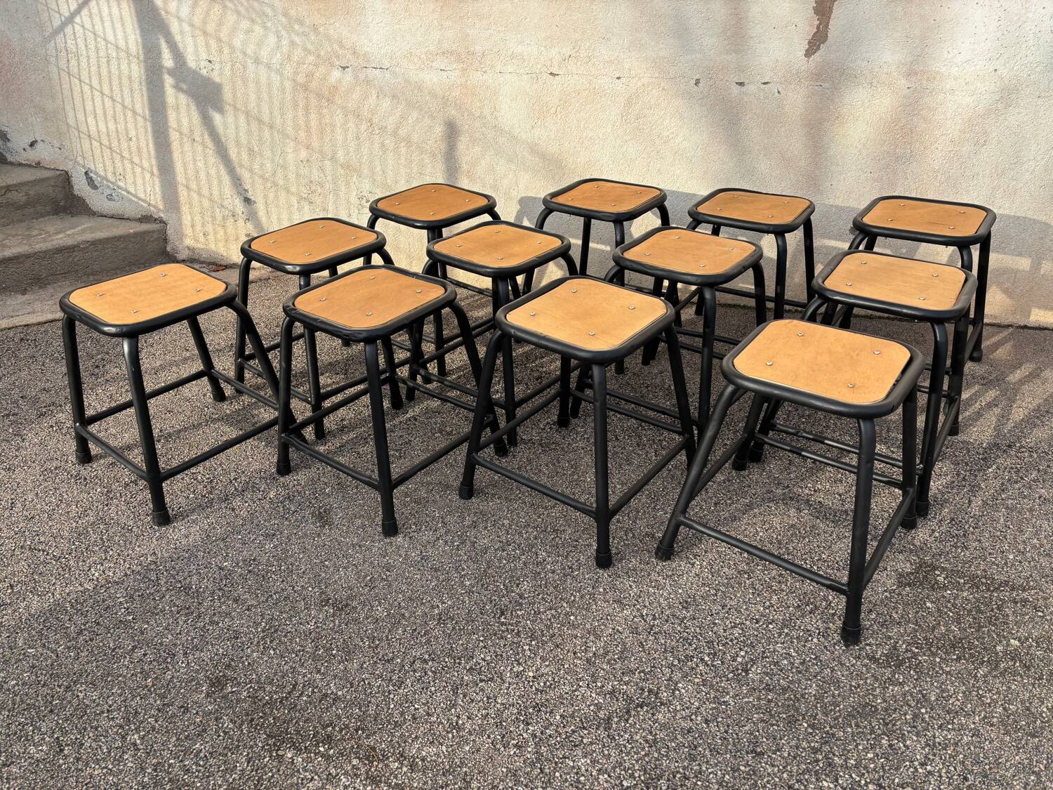 Set of 12 black industrial stools