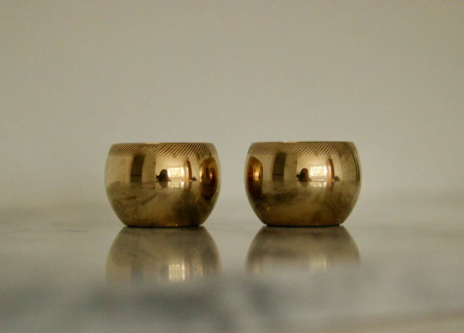 Pair of Swedish brass candlesticks from the mid-century by Skultuna.