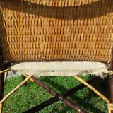 Wicker or rattan armchairs and bamboo