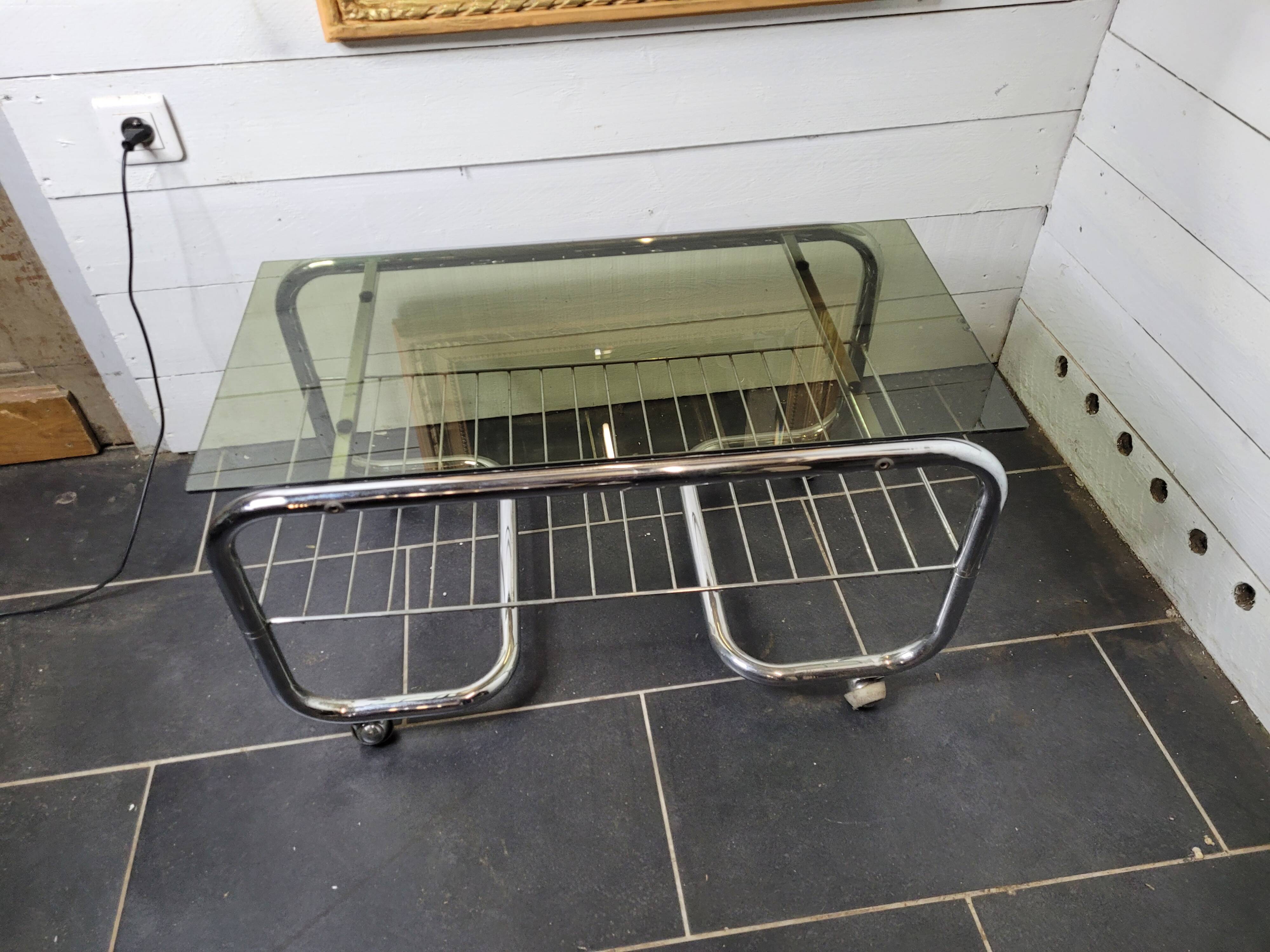 Coffee table with chrome base and smoked glass from the 70s