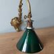 Wall light in bronze art nouveau with green opaline lampshades.