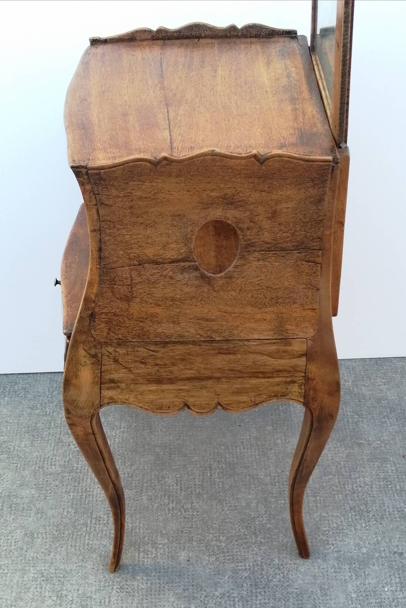 Belly bedside table with Louis XV style walnut mirror early 20th century 1920.
