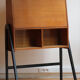Vintage 1960s secretary in oak veneer with a drop-down front.