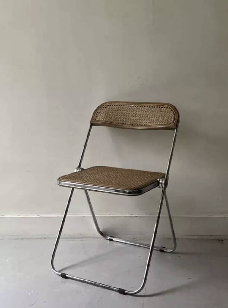 Plia folding chair in chrome and cane by Giancarlo Piretti, design 1970.