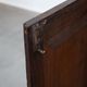 Charming and timeless antique English oak cabinet/commode from the early 19th century with two doors and a working lock
