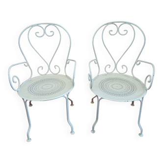 Pair of wrought iron garden chairs year 40