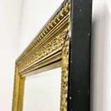 Vintage rectangular classical gold and black mirror. France, 1970s.