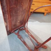 Bistro table over wood cast iron legs