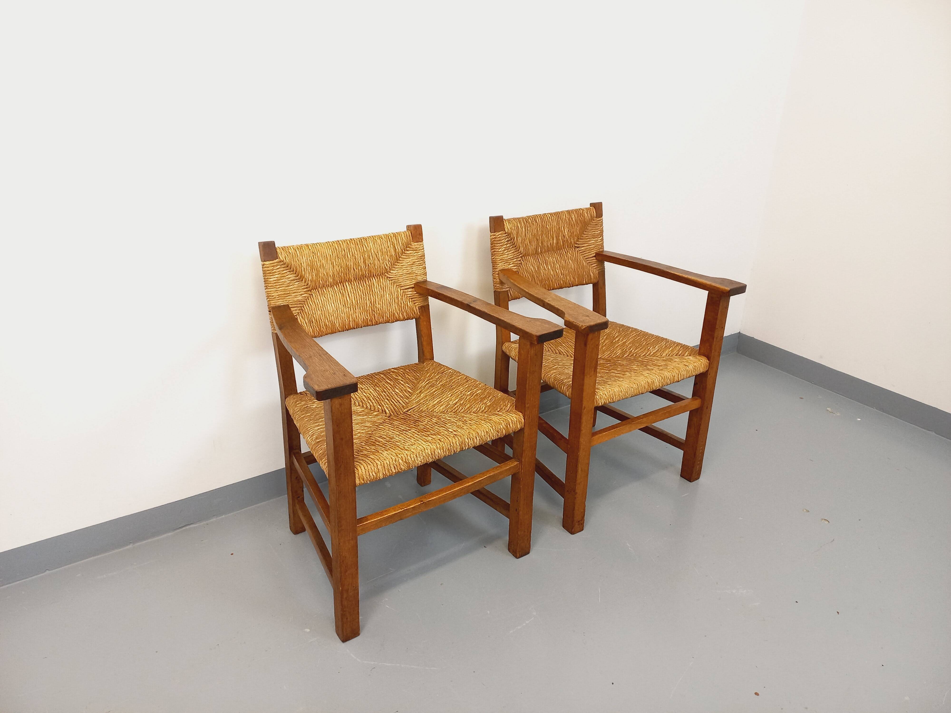 Set of 2 vintage brutalist armchairs in oak wood and straw