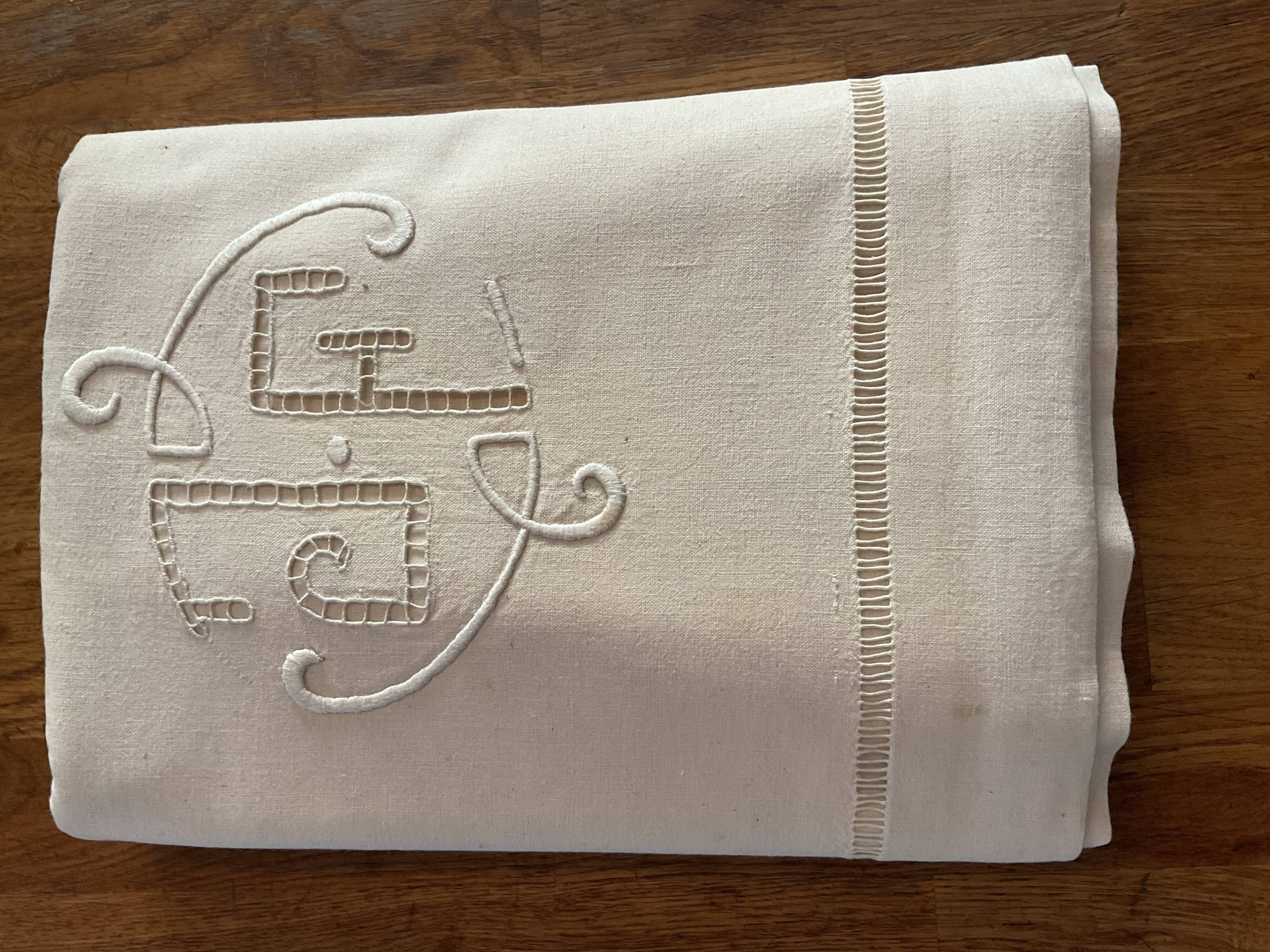 Old embroidered sheet. J F