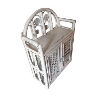 White rattan wall shelf
