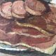 Oil on canvas still life with a baguette and sausage from the 1940s.