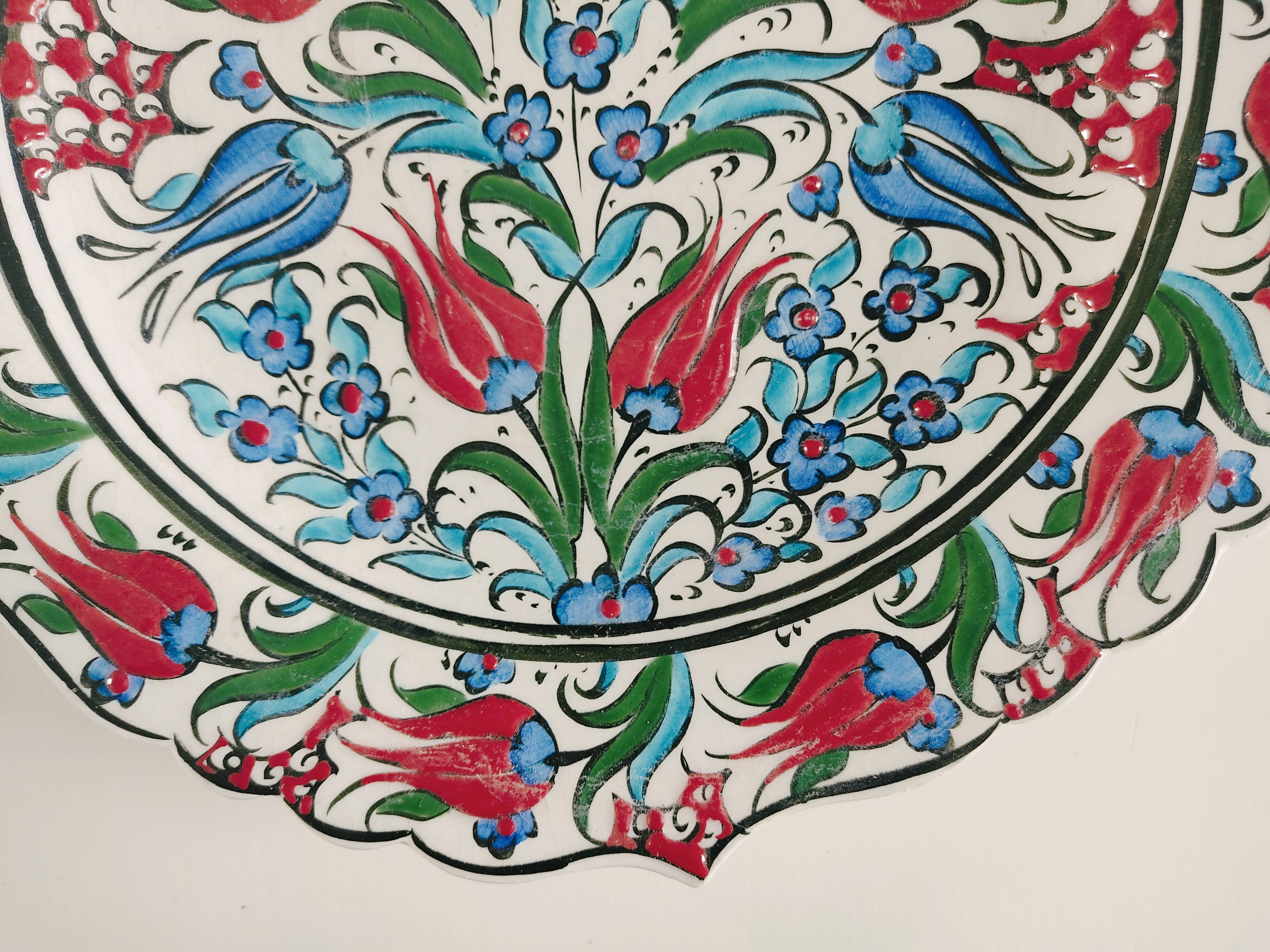 Empty pocket decorated with red and blue flowers