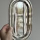 Small vintage oval tray in shiny lightweight metal