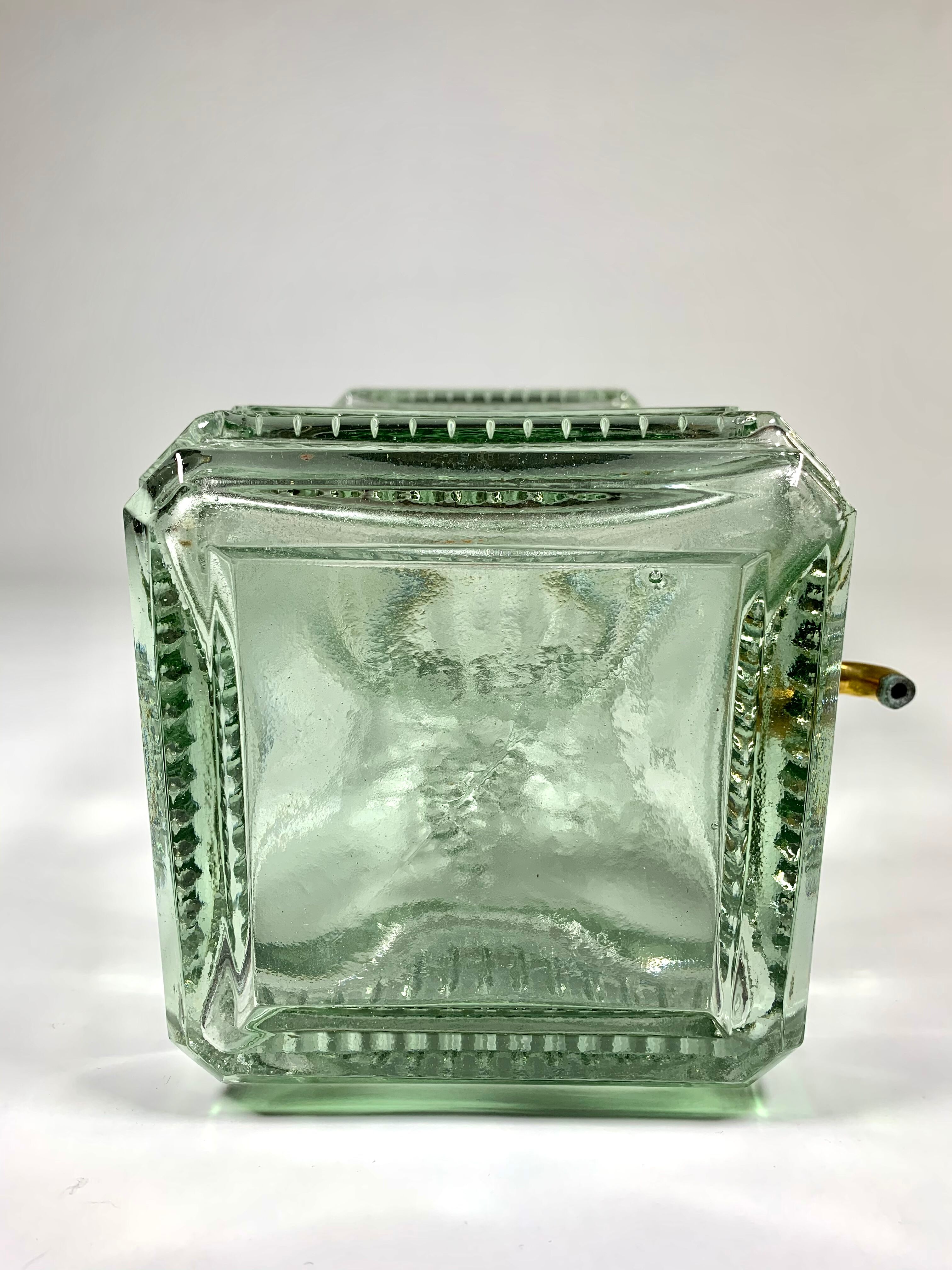 Quadrangular glass fountain and brass tap