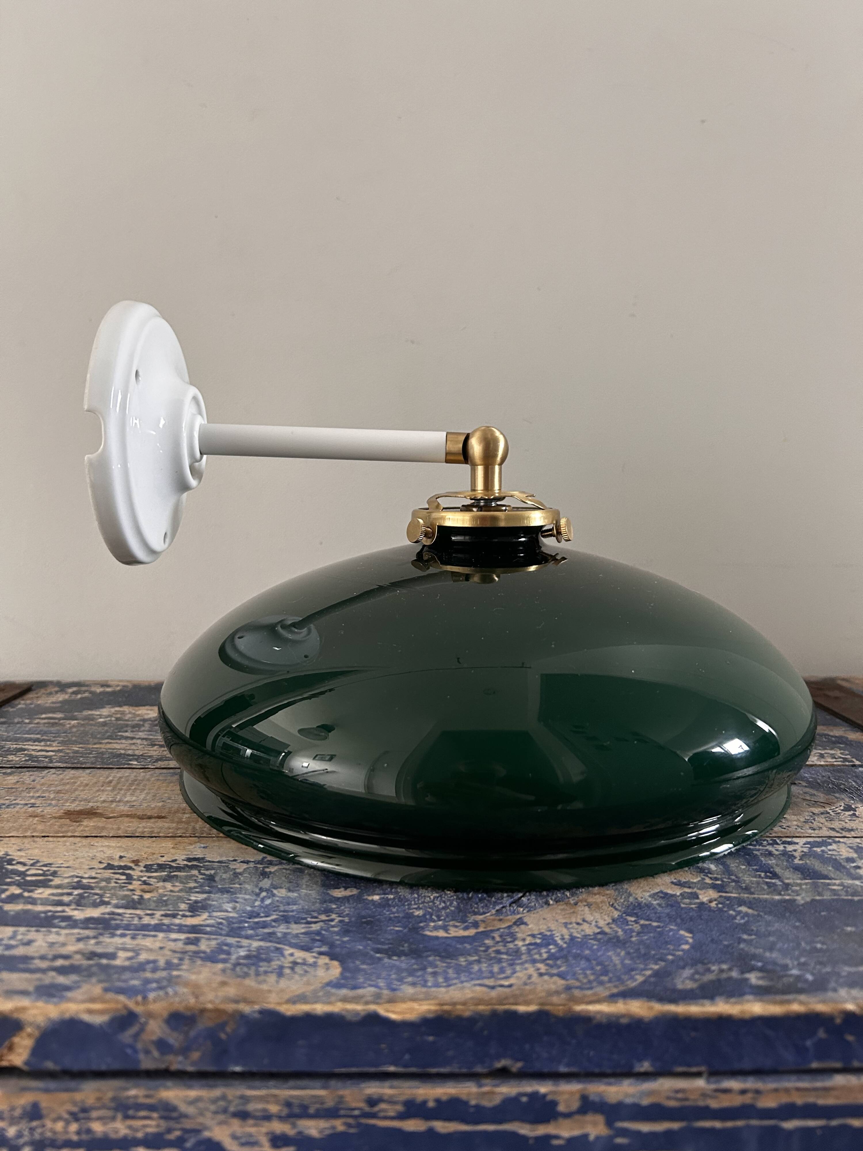 Tilting wall light in green opaline