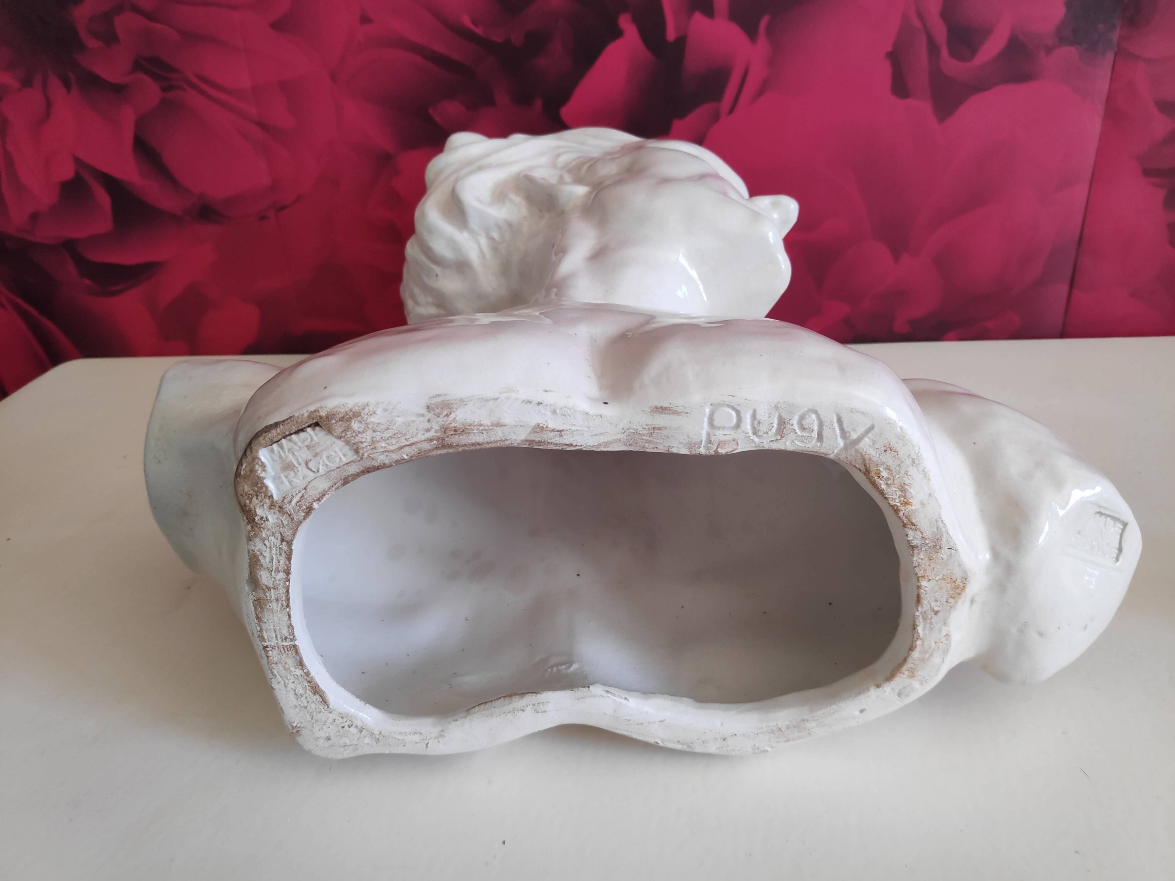 Bust of J. Mermoz in white cracked ceramic by H. Laurens