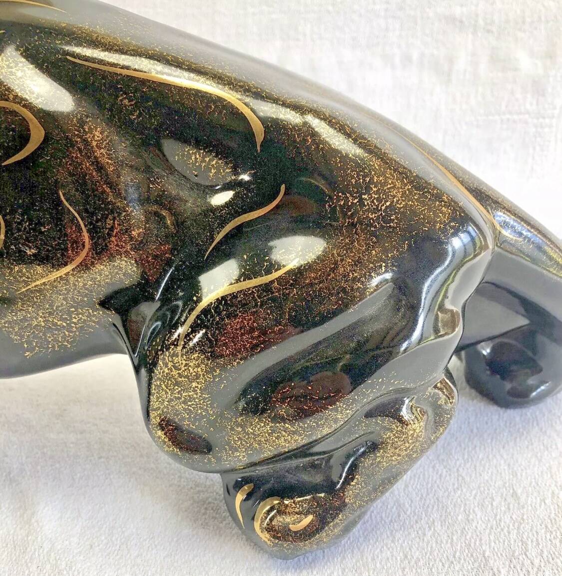 Art Deco lion statue 1930 cracked Saint Clément