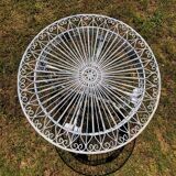 Ancient folded garden lounge in cast iron