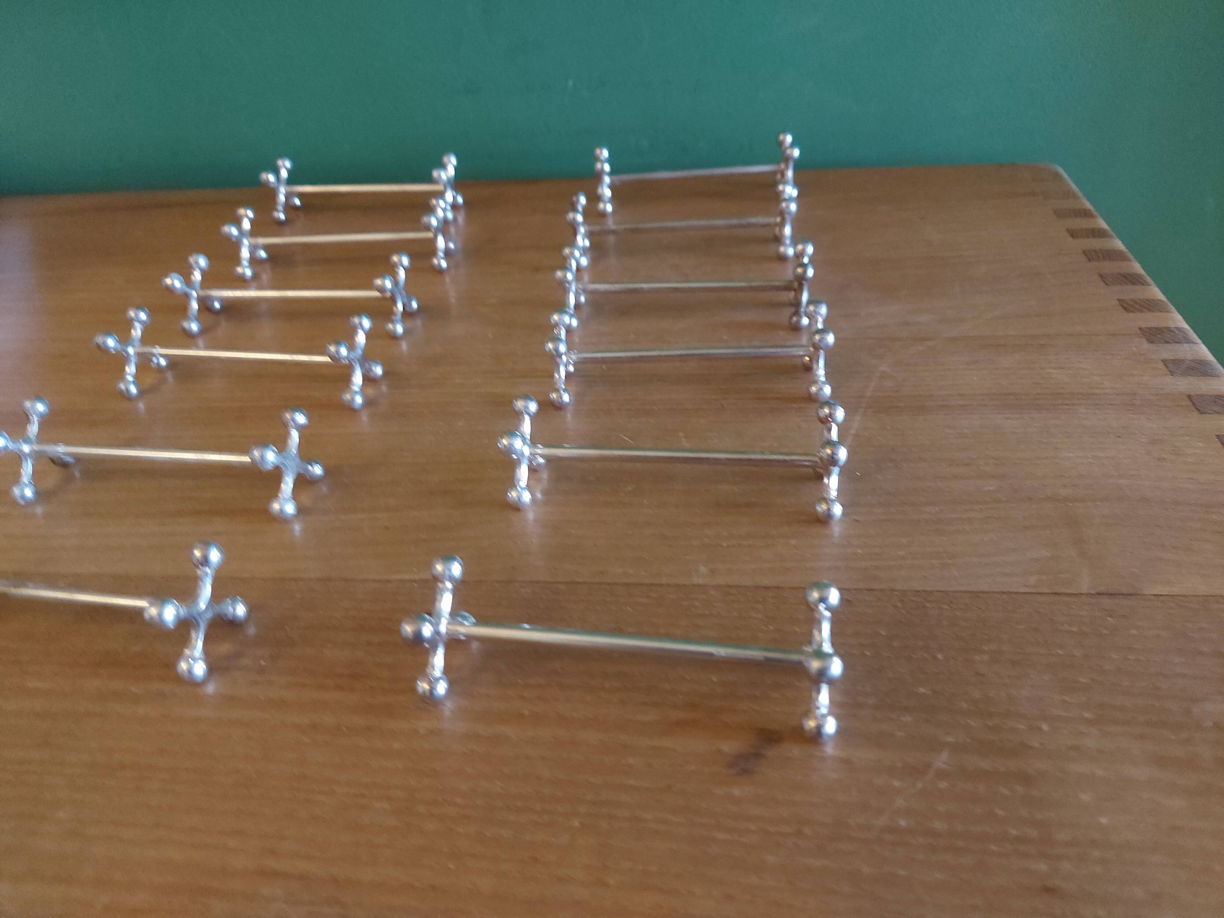 12 Christofle silver metal knife doors, pearl model