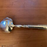Old sauce spoon