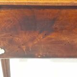 Small old side table with brass finishes