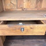 Empire wardrobe in solid walnut, France, mid-19th century.