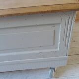 Coffee table on casters, made from an old desk, pearl gray base and belt.