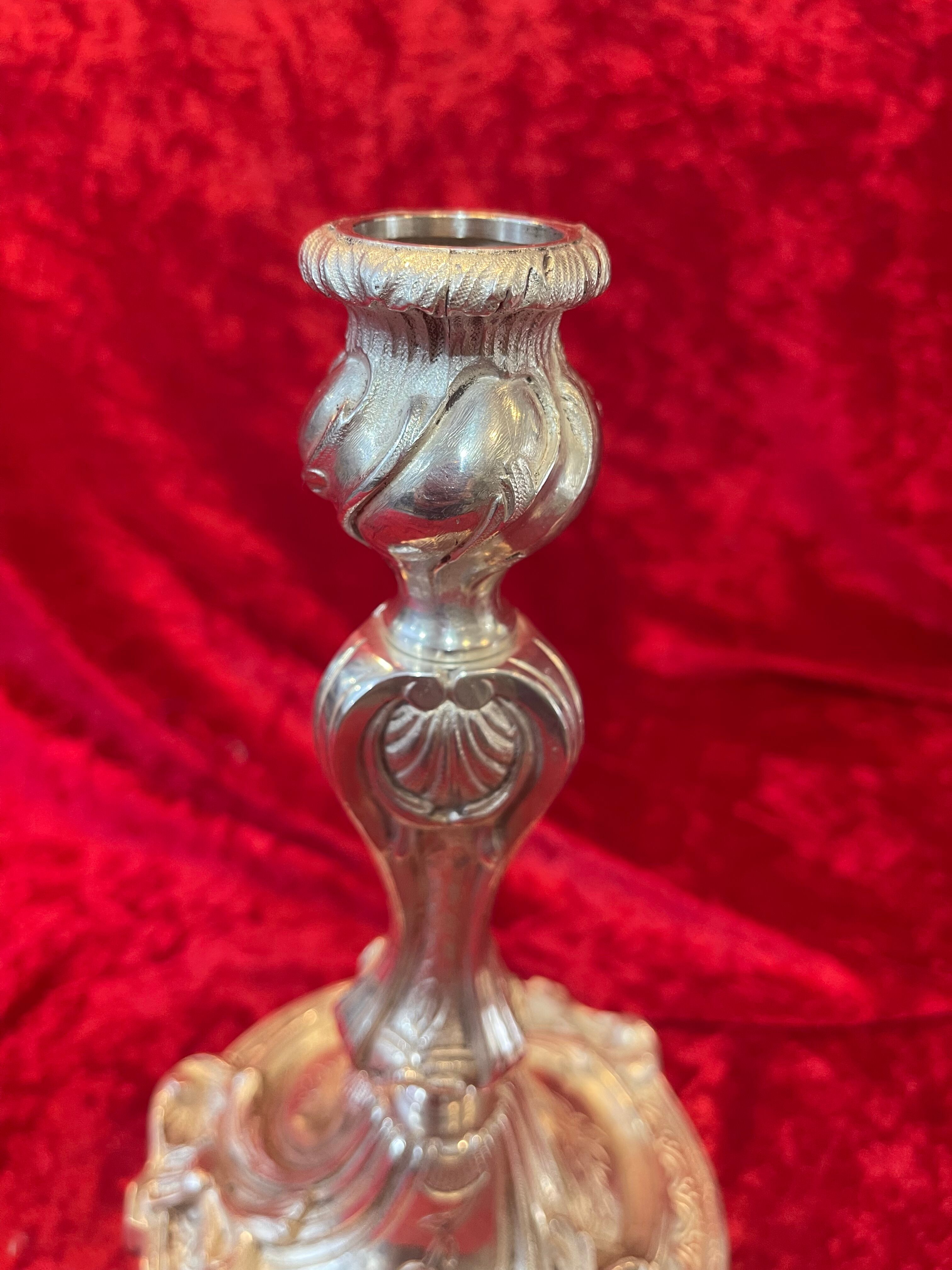 Pair of candlesticks, torches in silver bronze