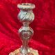 Pair of candlesticks, torches in silver bronze