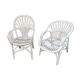 Deux fauteuils en rotin blanc