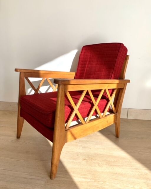 Pair of vintage wooden armchairs with braces