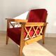 Pair of vintage wooden armchairs with braces