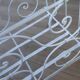 Wrought iron baby bed. Or bench seat of your choice