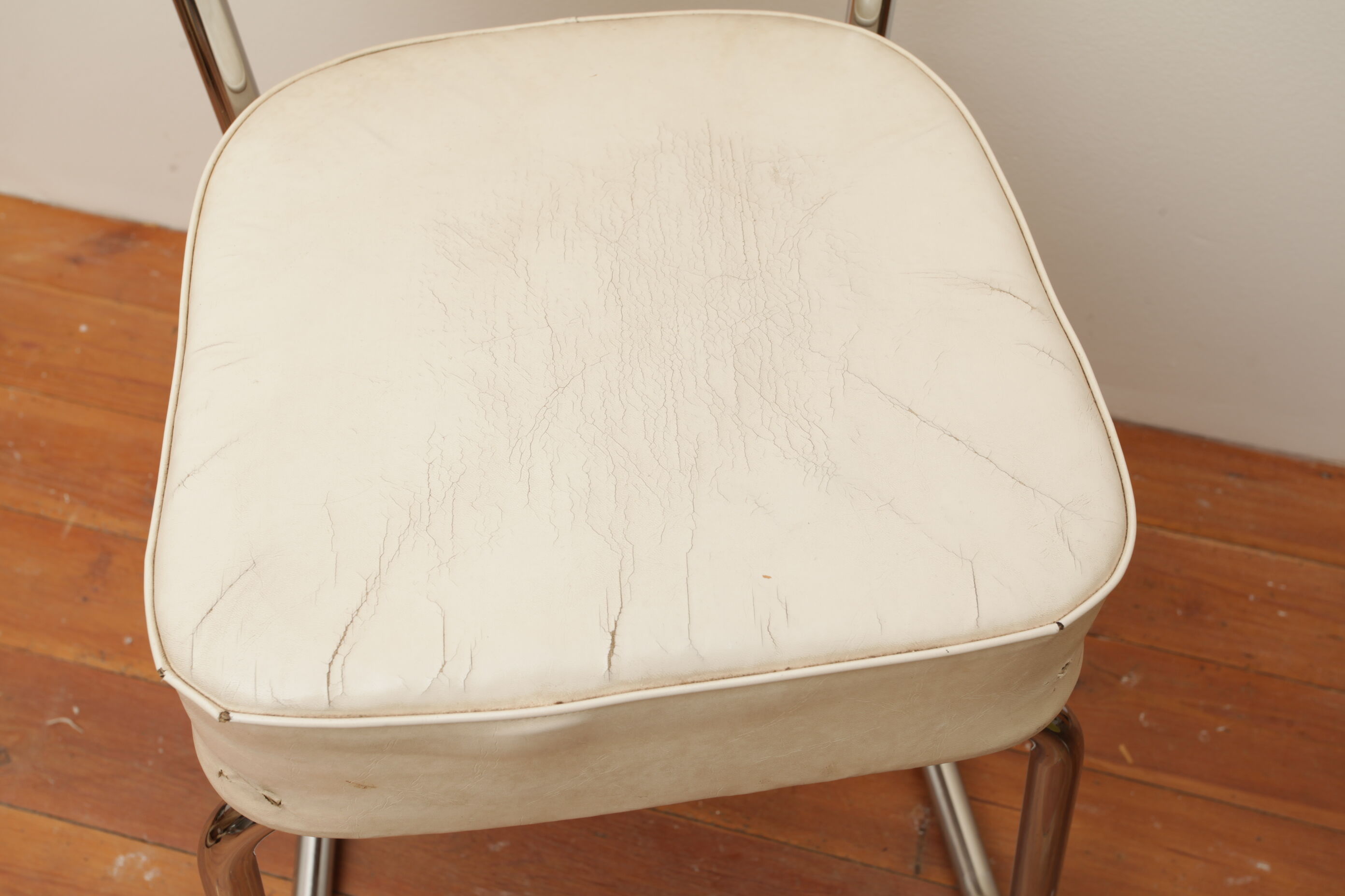 Fauteuil skaï blanc