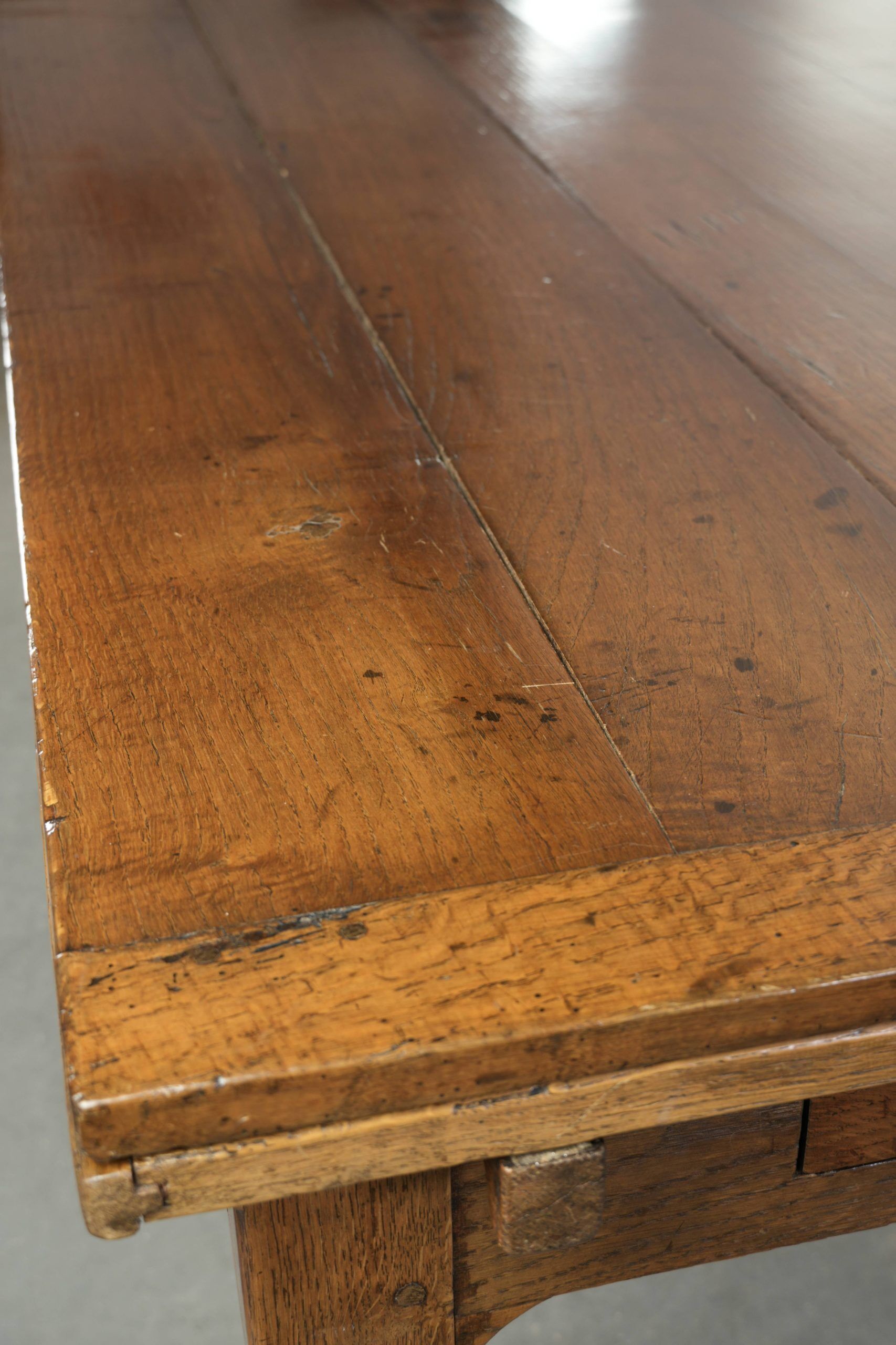Antique oak dining table from the late 18th century with extendable leaves