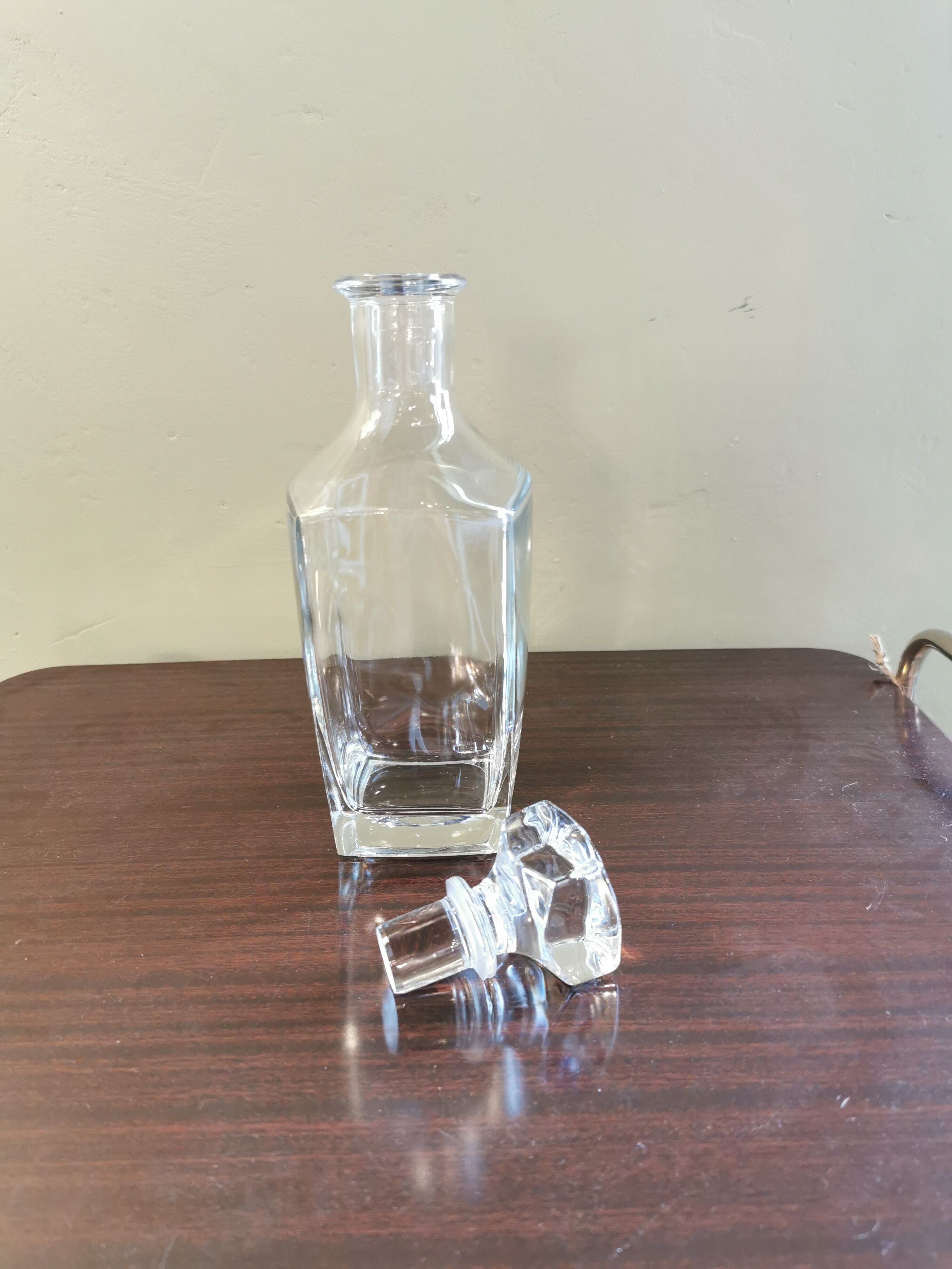 Square vintage decanter made of transparent glass
