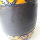 Vase en céramique orange et marron