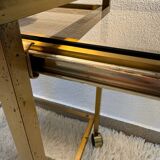 Brass rolling trolley with smoked glass from the 70s