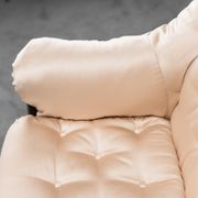 Fauteuil en tissu beige 70s vintage moderne