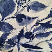 Two flat plates in earthenware with blue floral decoration.