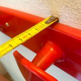Orange/red plastic hooks year 60