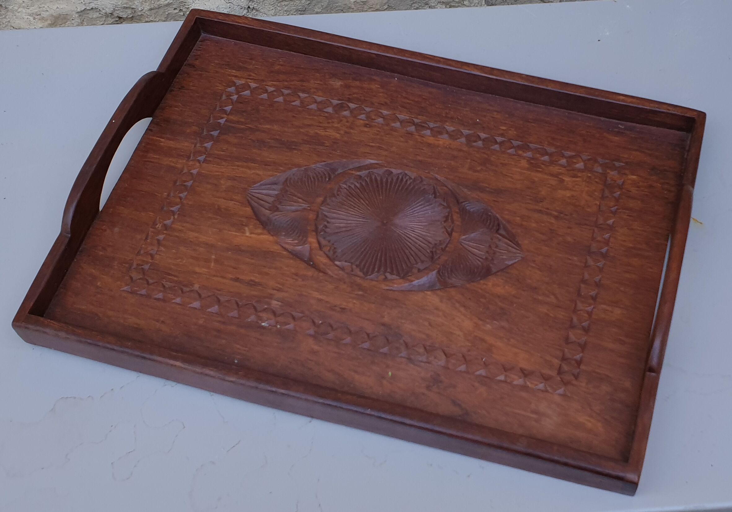 Ancient carved wooden tray