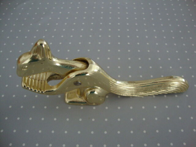 Nutcracker or hazelnuts vintage golden metal squirrel