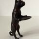 Pockets in the shape of a servant cat in bronze of reddish-brown patina